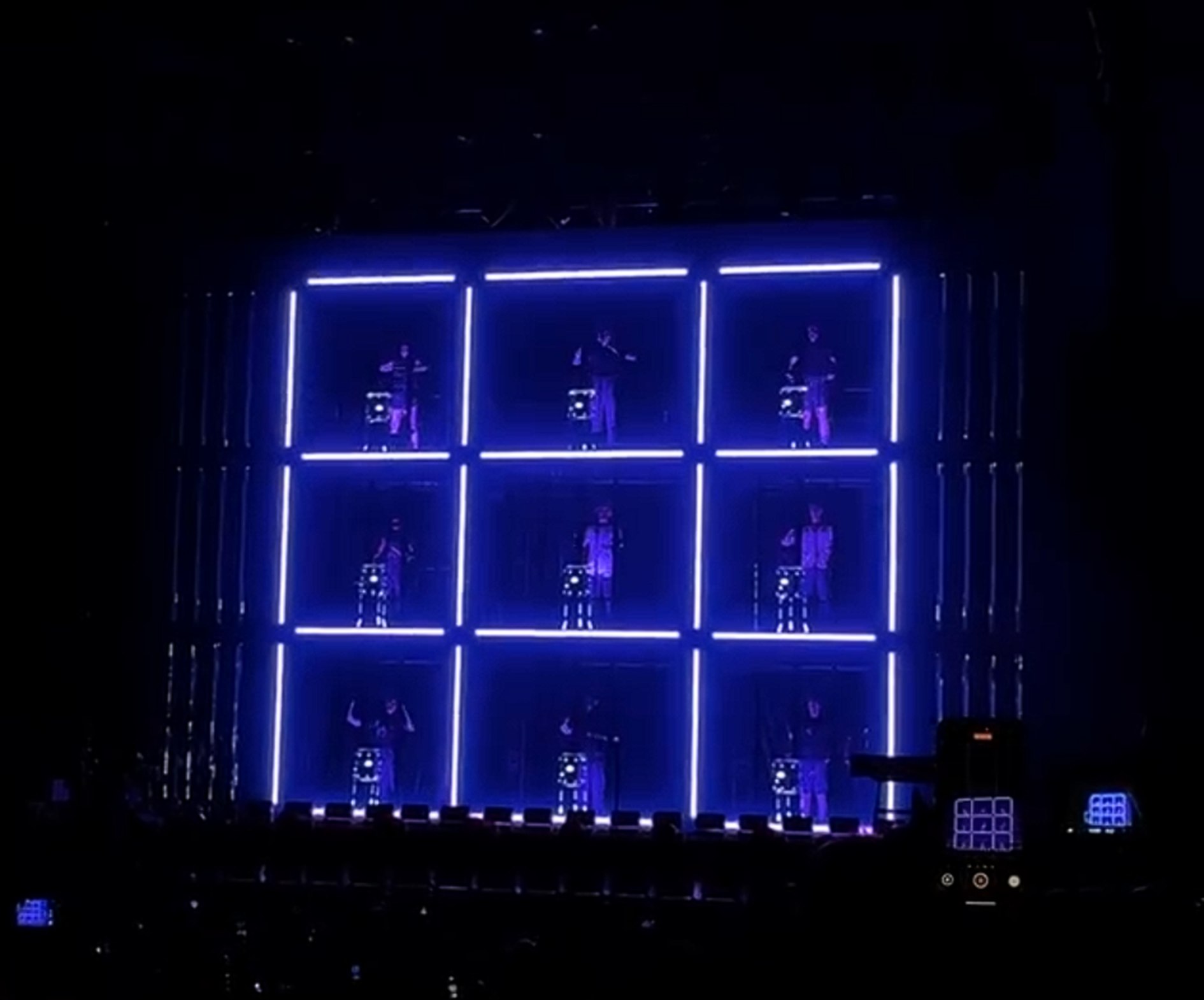 The encore - the nine-bay grid lit behind the see-through wall