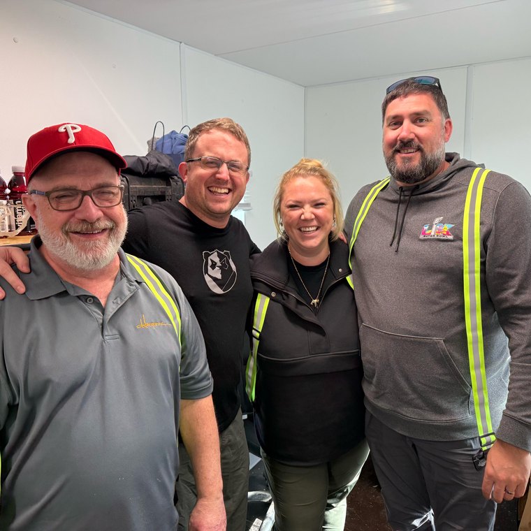 Crew backstage in hi-vis